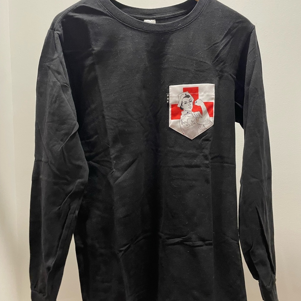 Black Long-Sleeve Pocket Tee with Red Cross Graphic